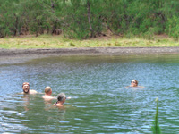Swimming in the warm waters of the inner lake where the hot springs feed in
