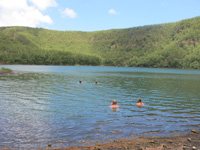 Swimming in the warm waters of the inner lake where the hot springs feed in